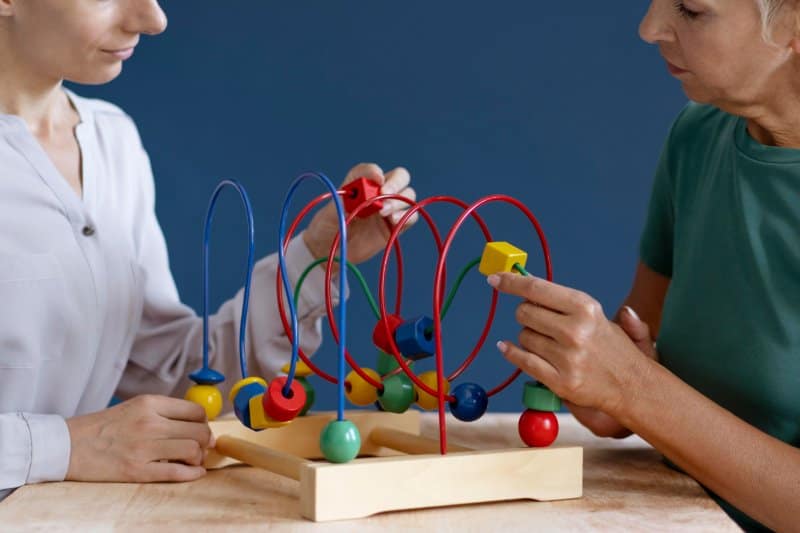 Our Services woman occupational therapy session with occupational therapist 800x533